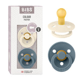 BIBS two-pack pacifiers in ivory and petrol for stylish soothing.