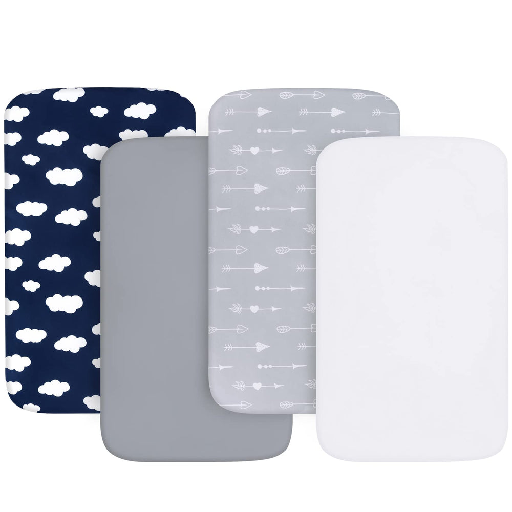 Biloban baby bassinet sheets with a fully encased elastic edge for secure fit.