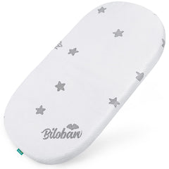 Biloban bassinet mattress pad with oval cover offers breathable comfort for peaceful nights.