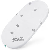 Biloban bassinet pad shows snug 17x29 fit with secure edge support.