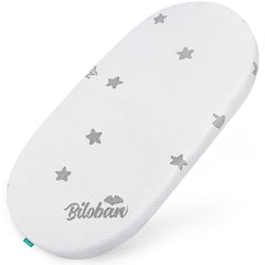 Biloban bassinet pad shows snug 17x29 fit with secure edge support.