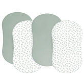 Biloban bassinet sheets in green offer Halo compatibility for a secure fit.