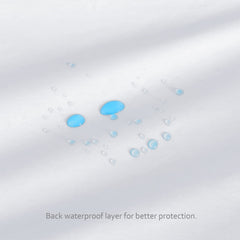 Biloban neutral white fitted crib sheet in a clean bedroom