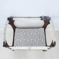 Biloban elastic-edge fitted sheet ensures a secure fit on standard pack and play mattresses.