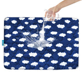 Biloban Pack and Play protector with navy cloud cover protects against spills.