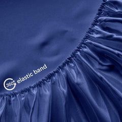 Biloban satin mini crib sheet with elastic snug fit on a mini crib