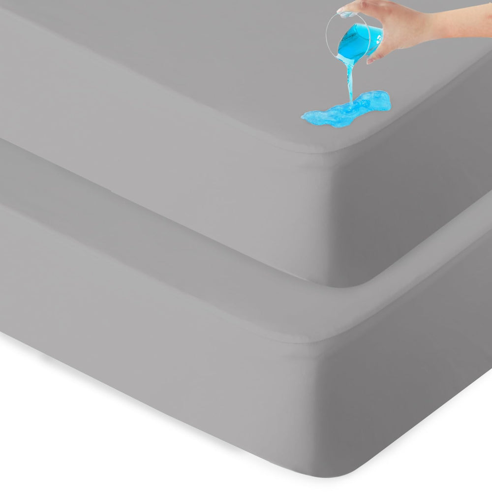 Biloban waterproof bassinet sheet 2-pack in grey protects the mattress from spills.