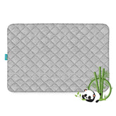 Biloban waterproof crib mattress protector showing leak protection for peaceful naps.