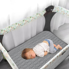 Biloban waterproof mattress pad surface prevents leaks during playtime