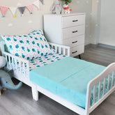 Biloban Whale toddler sheet set fabric closeup highlights silky microfiber for gentle sleep.