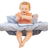 Binxy Baby 2-in-1 Cushy Cover blue arrows provides a soft, secure shopping seat.