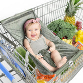 Binxy Baby shopping cart hammock attached to a standard grocery cart for hands-free shopping.