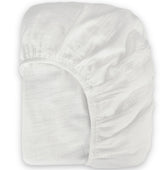 BIOWEAVES mini crib sheet laid flat to show soft organic muslin texture.