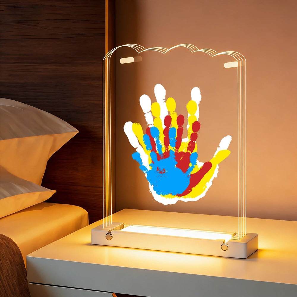 Bixinyo family handprint kit with light on a glowing wooden base for a cozy nursery display