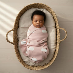 Bleu La La baby blanket swaddle setup demonstrates easy, cozy wrapping for newborn comfort.