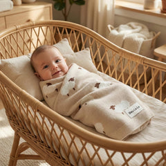 Bleu La La swaddle blanket in a stroller, lightweight warmth on the go.