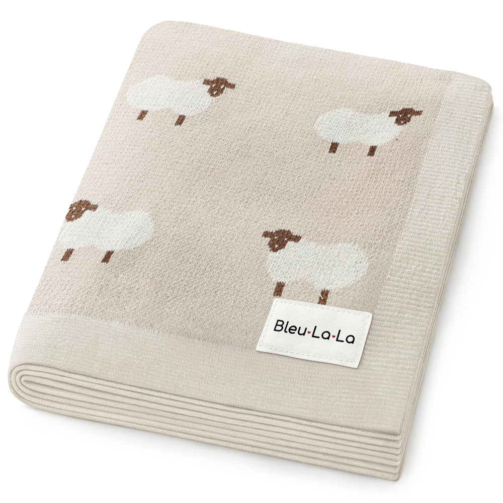 Bleu La La sheep-themed baby swaddle blanket in khaki for cozy newborn snuggling.