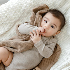 Bleu La La Heritage Knit blanket texture close-up emphasizing plush softness.