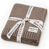 Bleu La La Heritage Knit swaddle blanket close-up shows soft organic cotton texture for newborn comfort.