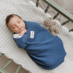 Gift-ready Bleu La La swaddle with ribbon in a denim blue finish