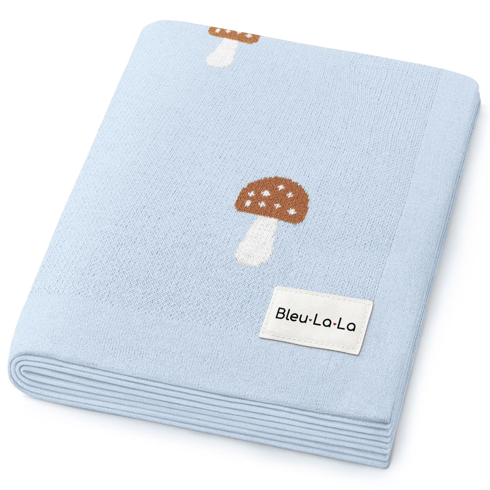 Bleu La La Mushroom Blue blanket close-up texture, buttery soft cotton for delicate skin.