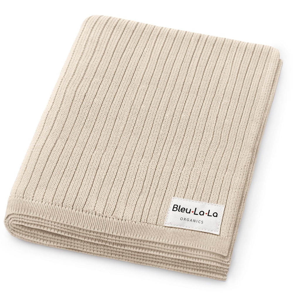 Bleu La La organic ribbed swaddle blanket in oatmeal, cozy texture for newborns.