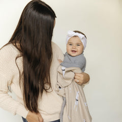 Bleu La La blanket in stroller shows versatile all-season warmth for outings.