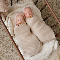 Bleu La La swaddle blanket close-up knit in oatmeal for breathable comfort.