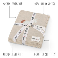 Bleu La La Unicorn Cream blanket on car seat cover for travel versatility.