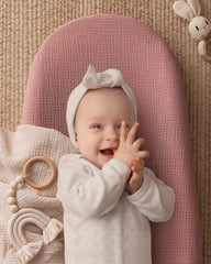 Blissful Diary contoured anti-roll sides securing baby during changes