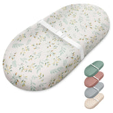 Blissful Diary botanical leaf changing pad with soft muslin cover for gentle diaper changes.
