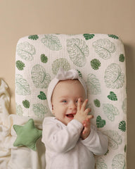 Elastic-band close-up on Blissful Diary changing pad cover shows a secure, snug fit.