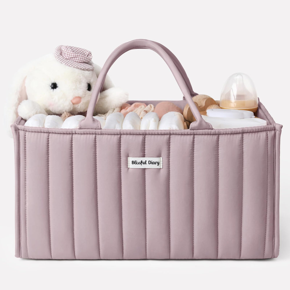 Blissful Diary diaper caddy with mauve pink handles for easy room-to-room transport.