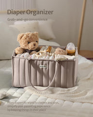 Portable diaper caddy for nursery, bathroom, living room, and car.