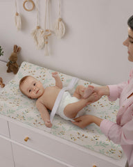 Blissful Diary muslin changing pad cover on a bassinet, ideal for gentle care.