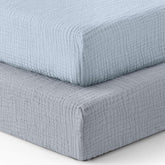 Blissful Diary muslin crib sheets in light blue pattern offering breathable baby comfort.