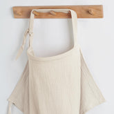 Blissful Diary muslin nursing cover in cream, breathable privacy during feeding.