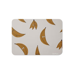 Blooom banana placemat for mealtime with spill-resistant surface.
