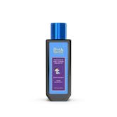 Blue Nectar baby hair oil packaging closeup with organic ingredients and safety labeling.
