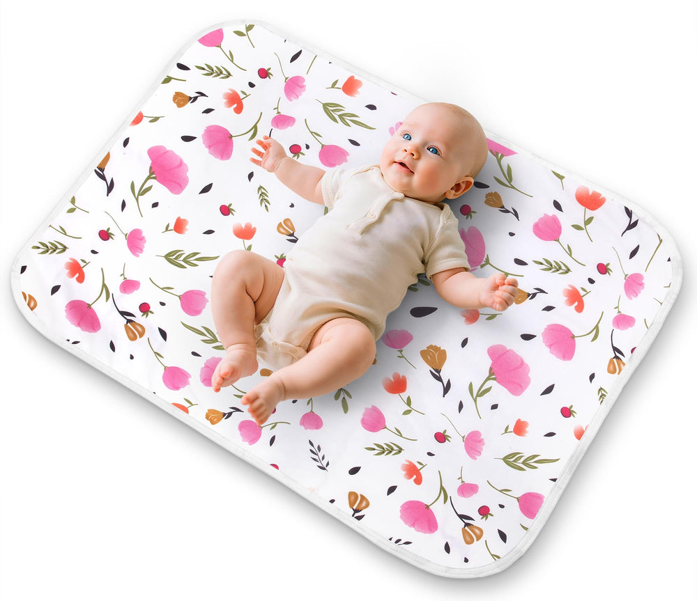Bnditeu diaper changing pad in purple flower pattern with soft cotton top.