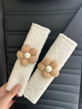 BNTR car seat belt cover with brown flower design offers protection and style.