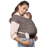 Boba Baby Wrap Grey worn by a parent for close bonding.