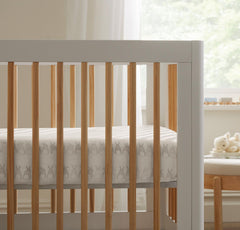 Boll & Branch crib sheet featuring secure-fit elastic for a snug mattress.
