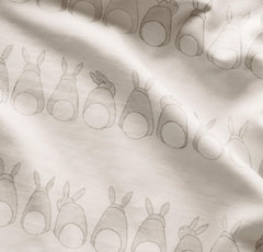 Boll & Branch Signature hemmed crib sheet close-up stitching detail for durability.