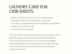 Boll & Branch Sky crib sheet edge stitching highlights durable finish