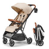 Bombi Bēbee V2 sand stroller front view, compact design for city trips.