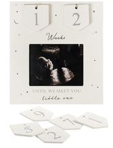Boom Moments sonogram frame displaying countdown weeks for nursery keepsake.