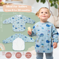 Bornealand long sleeve bib in light blue protects clothing during meals.