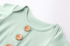 Bow Dream convertible mittens with gown keep tiny hands safe during sleep and wear.