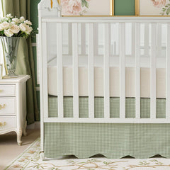 Brandream scallop edge crib skirt in green gingham adds soft texture to the nursery.